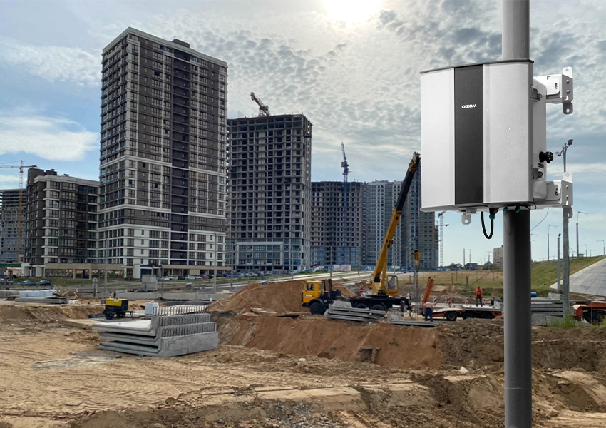 Dustroid is installed at a construction site of a residential building. The Dustroid is monitoring real-time dust and automating the dust control system